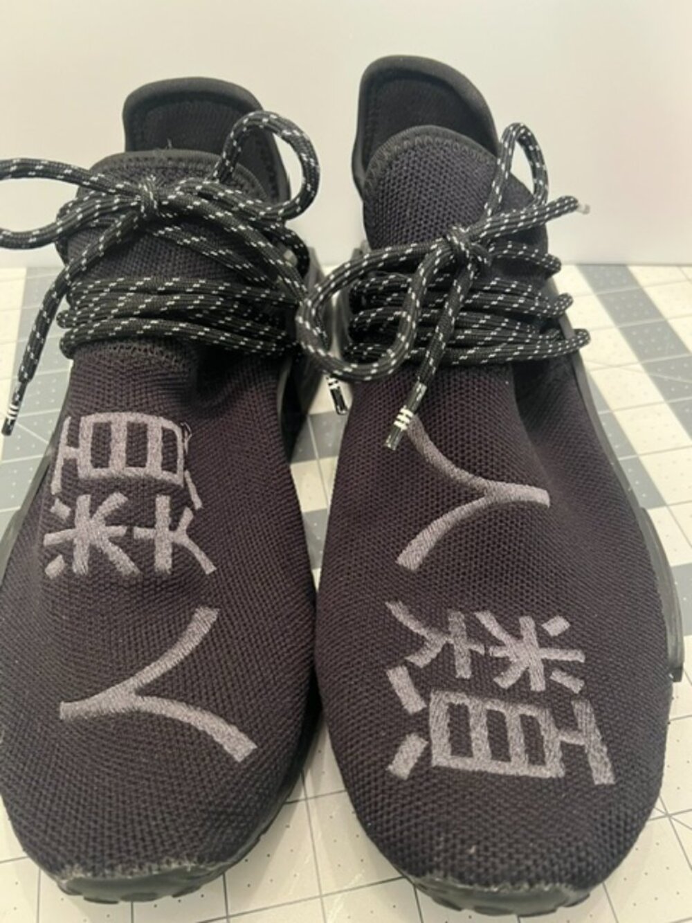 Adidas NMD Hu x Pharrell "Core Black" sneaker "Human Race" released in 2020 M8.5